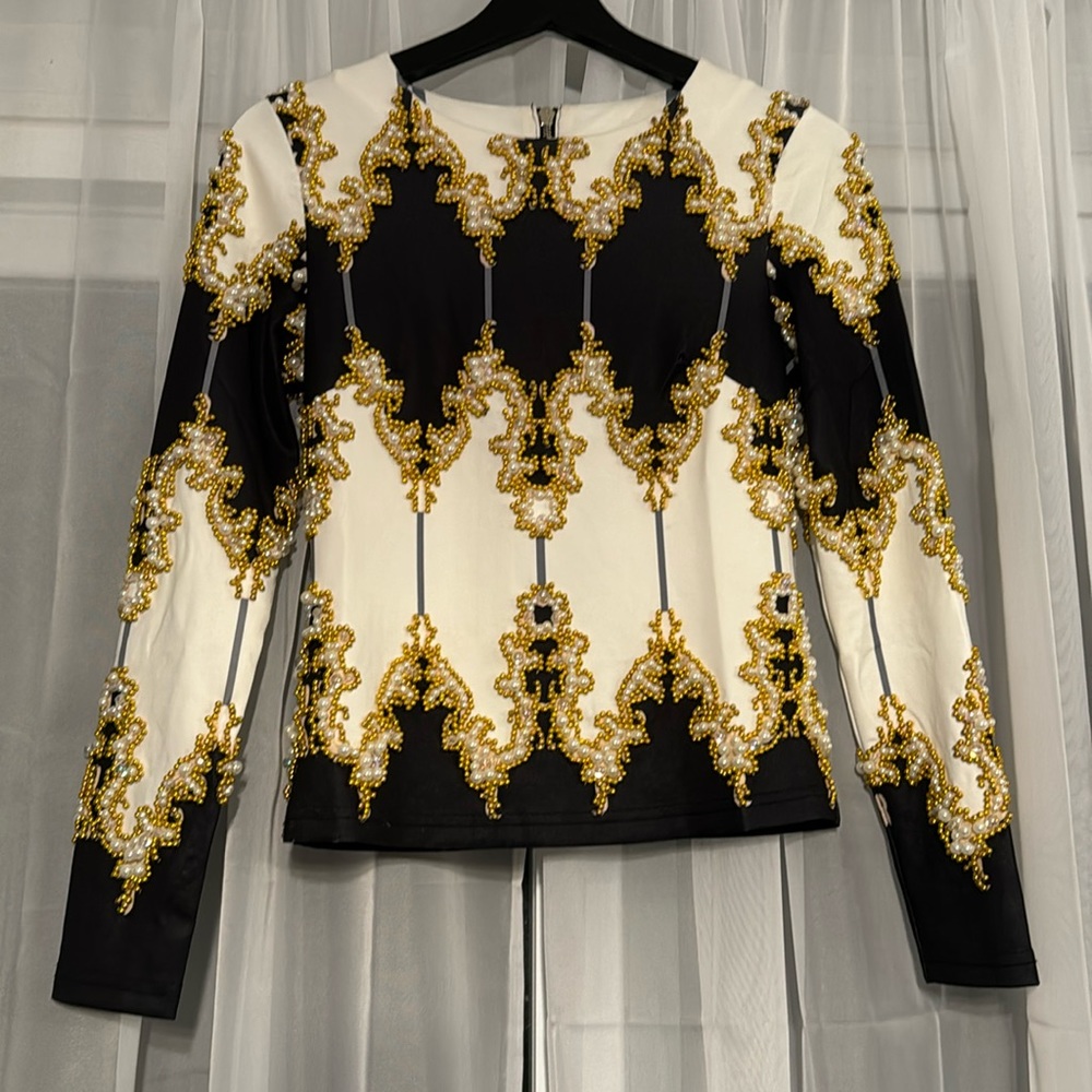 Designer hand stitched top